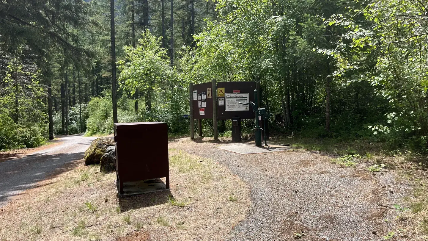 Cascade CampgroundFee board and water source.