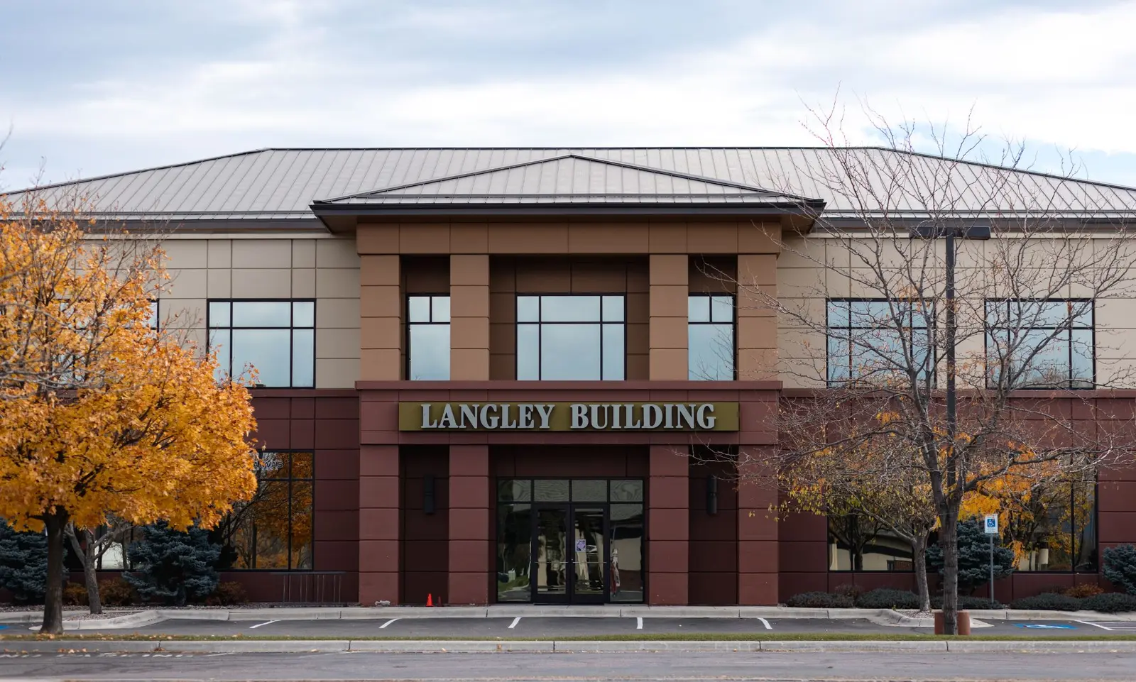 A front view of a two-story building labeled with its name.