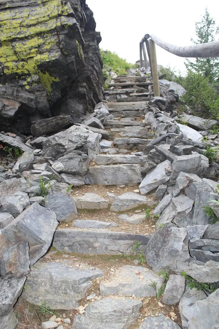 Image looking up the primitive stone stairs leading up to the Up Up lookout on the Lolo National Forest, Montana.