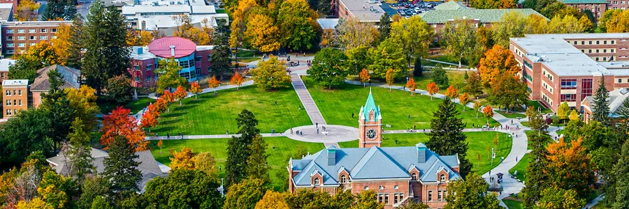 The Oval at the University of Montana in fall as the trees begin to change color, as seen from up Mount Sentinel looking down