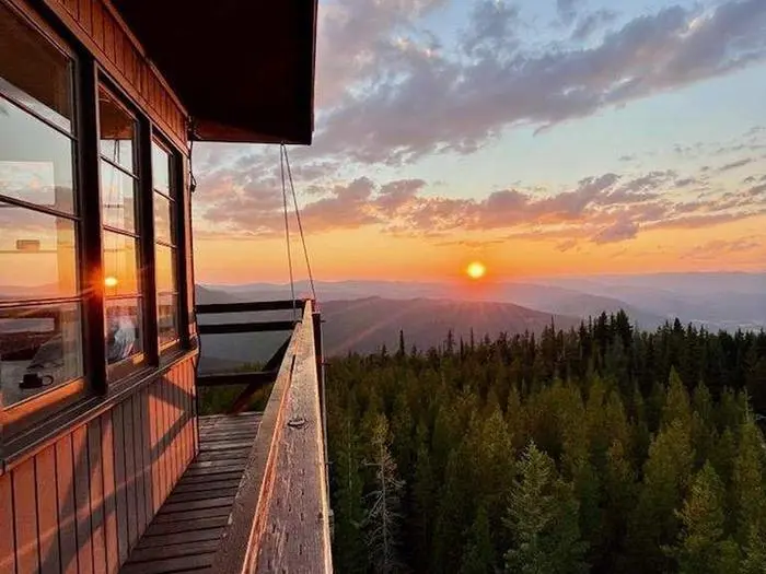 Photo lookout out of the Up Up lookout onto the sunset on the Lolo National Forest, Montana.