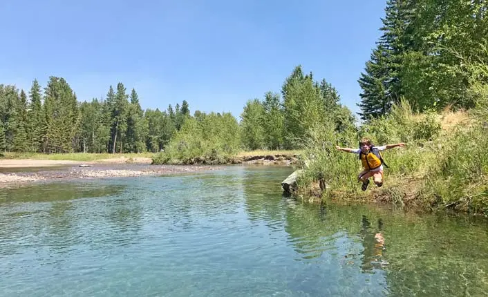 Swimming in the Blackfoot River at the Lincoln Community River Park. Photo by Five Valleys staff.
