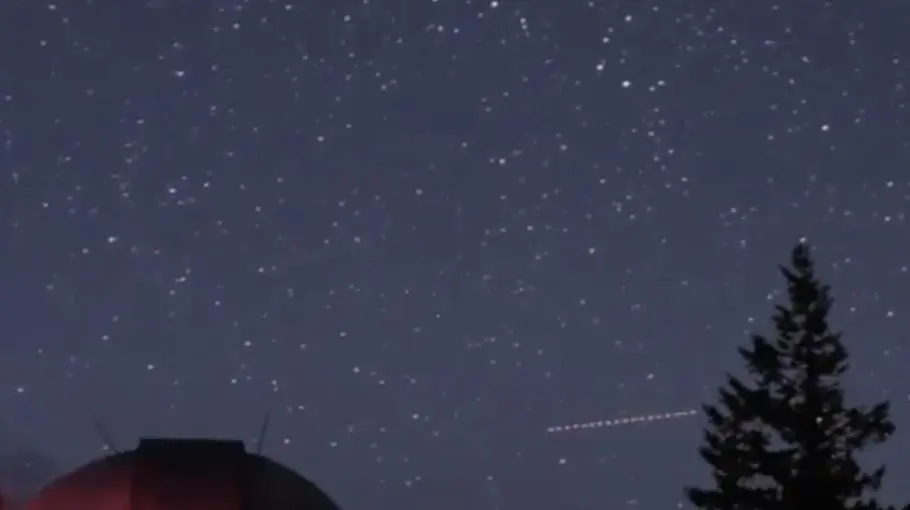 shooting star above the observatory