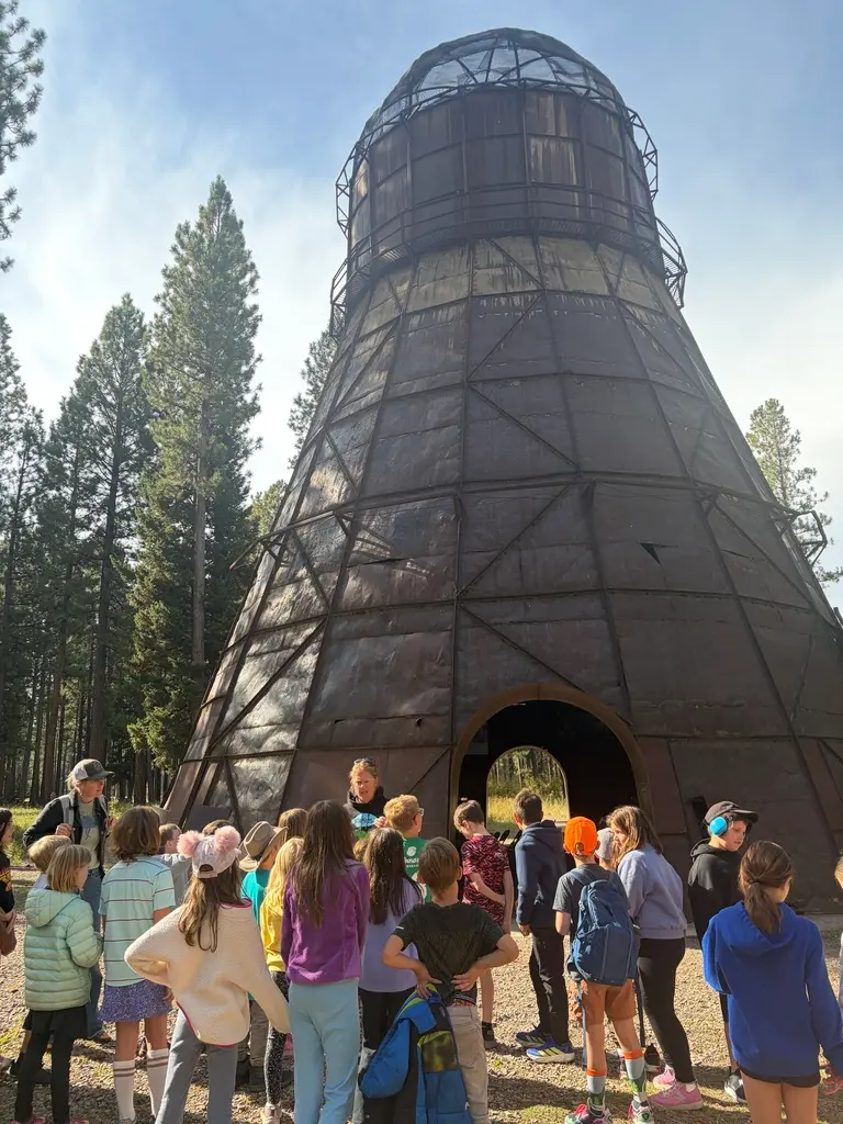 Students are observing one of the sculptures.