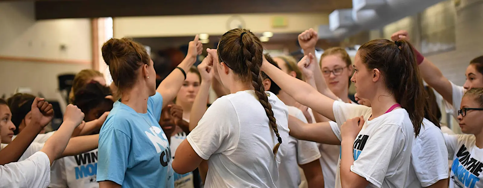 Campers huddle together for all-in commitment