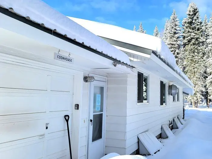 Image of the cookhouse in the wintertime at the historic Savenac area on the Lolo National Forest, Montana.