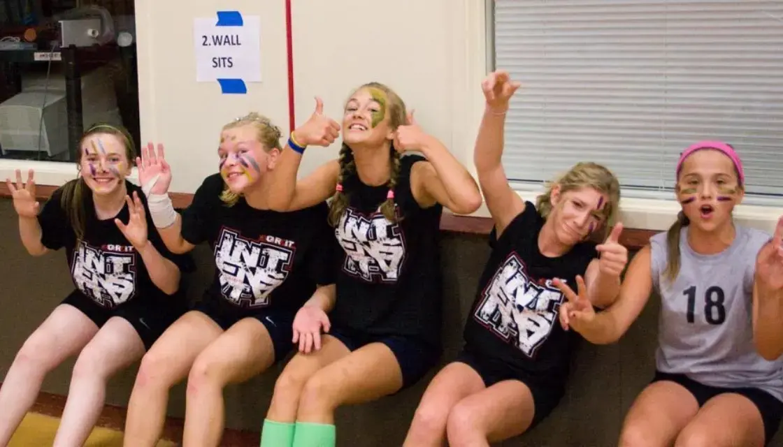 Girls volleyball Camp Intensity night at NBC Volleyball-- girls in wallsits