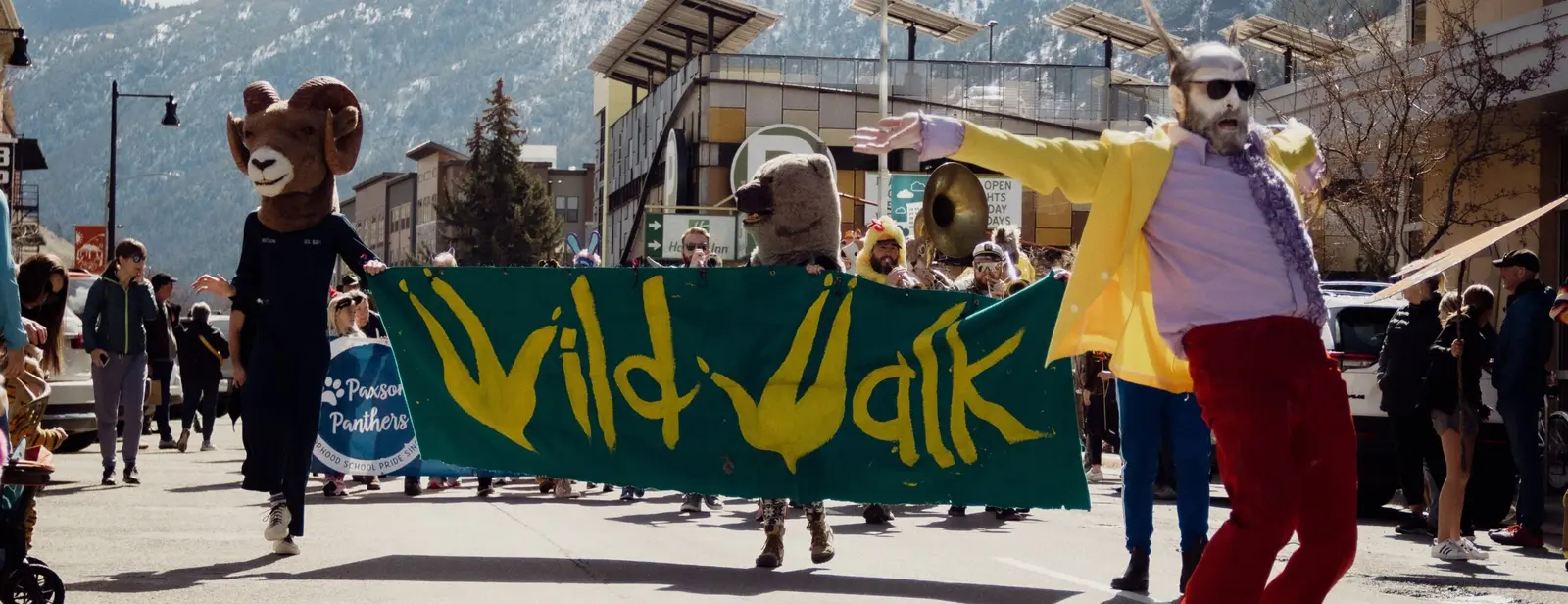 People dressed up in animal costumes at the 2023 WildWalk festival in Missoula, Montana.