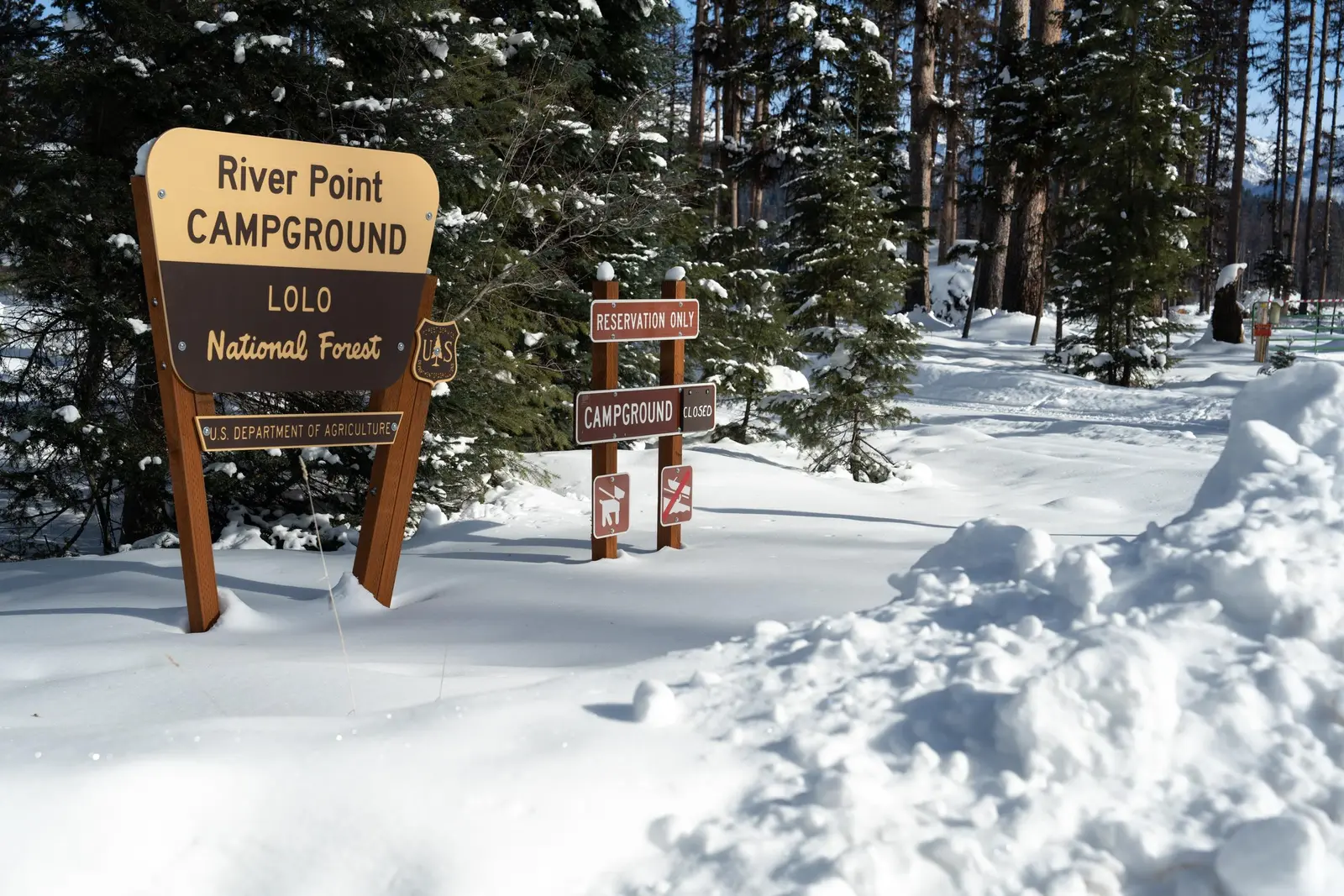 Photo of the River Point Campground at Seeley Lake in wintertime, Lolo National Forest, Montana.