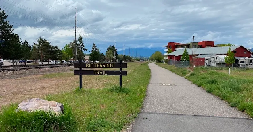 A view of a trail with a sign reading Bitterroot Trail.