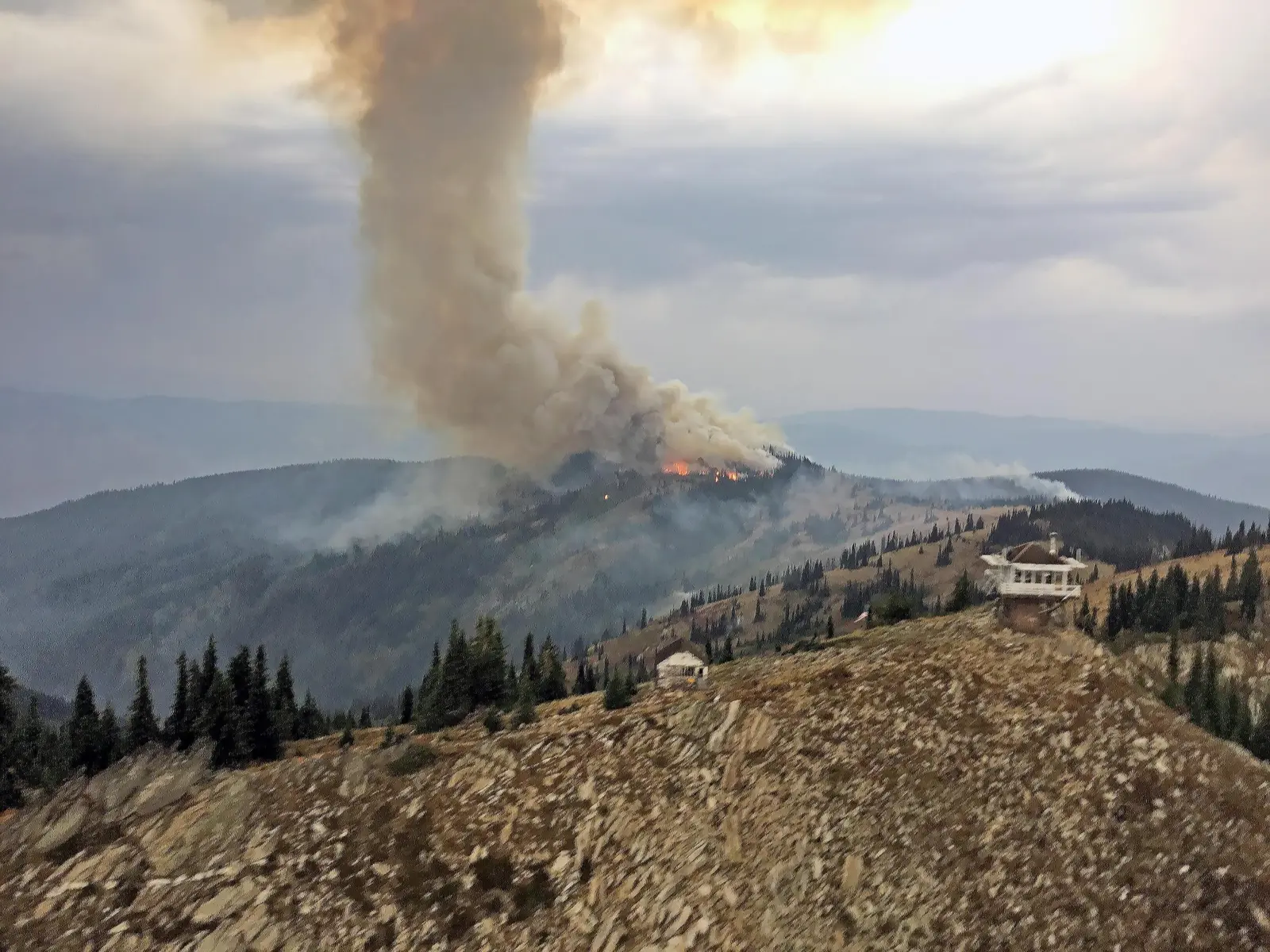 a fire on a mountaintop