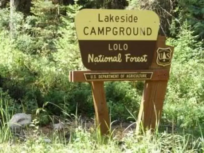 Lakeside Campground Entrance Sign- it is Cream and Brown in Color with a Forest Service ShieldLakeside Campground Entrance Sign