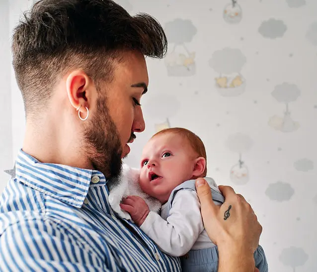Father Holding Baby