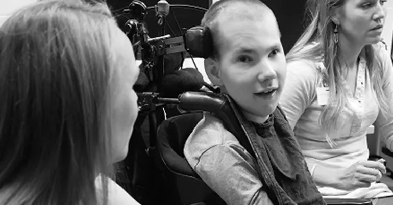 a young man on a wheelchair